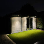 Light Grey Composite Garden Room At Night