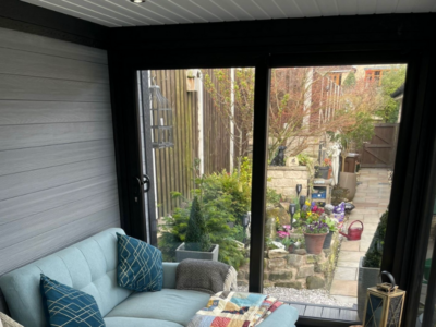 Internal Light Grey Black Posts Sliding Door Garden Room