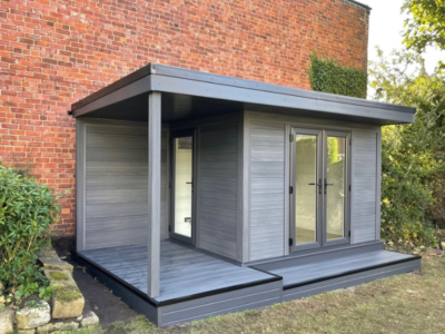 Dark Grey On Dark Grey Posts Garden Building With Side Canopy